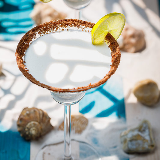 Key lime pie martini with a graham cracker crust