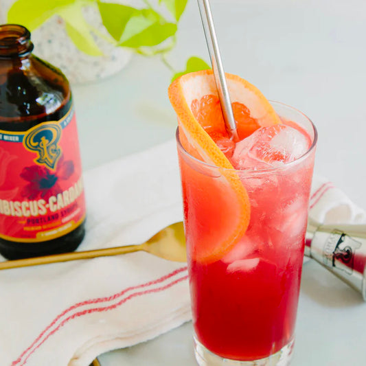 A low sugar mocktail recipe with grapefruit, hibiscus and bubbles.