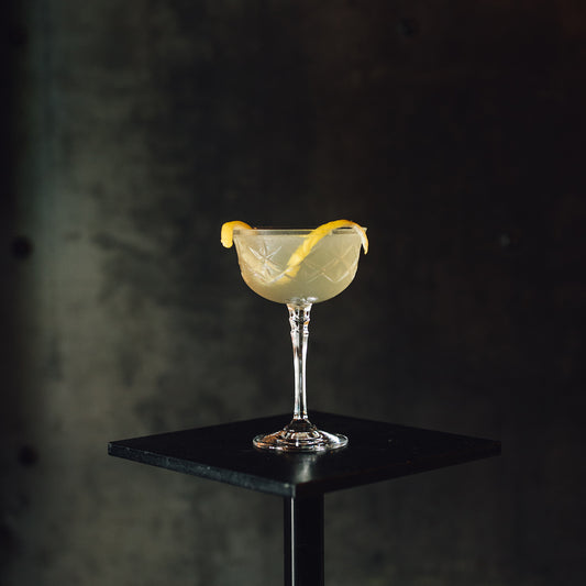 A play on a classic Bee's Knees cocktail recipe with Yellow Chartreuse and gin 