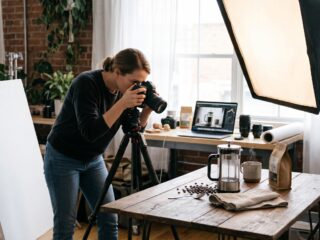 Ecommerce product photography tips showing a photographer capturing coffee products in a studio