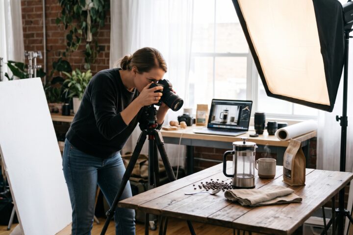 Ecommerce product photography tips showing a photographer capturing coffee products in a studio